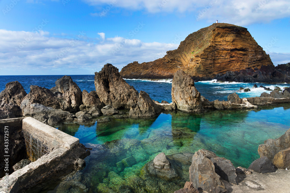 Swimming natural pools of volcanic lava in Porto Moniz, Madeira island, Portugal, Europe