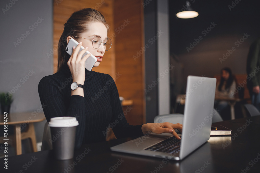 Woman works remotely online from home while quarantine coronavirus is in effect. Concept of checking mail, blogger Woman works remotely online from home while quarantine coronavirus is in effect. Concept of checking mail, blogger