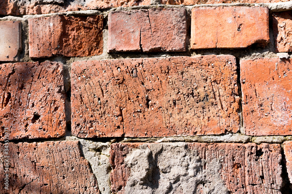 Obraz premium Textured Red brick wall. Block background, design pattern
