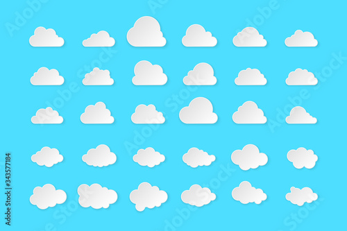 Set of clouds. Cartoon clouds isolated on blue background. Vector illustration.