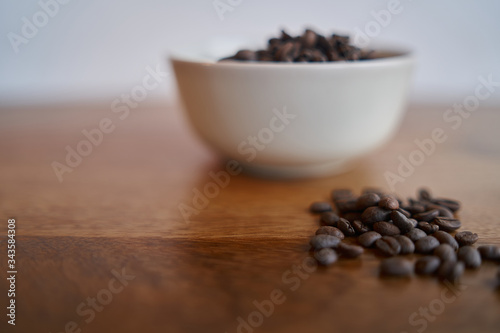 Detail coffee beans on wood table