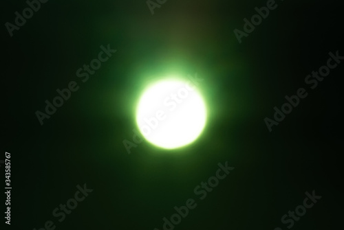 blur, bokeh, bokeh lights, bokeh background, a photo of the Sun with a green filter