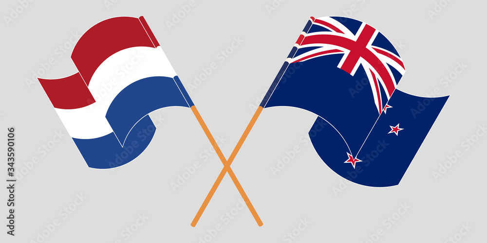 Crossed and waving flags of New Zealand and the Netherlands Crossed and waving flags of New Zealand and the Netherlands