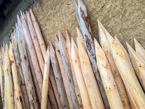 Obraz na plátně Texture of wooden stakes in a different perspective