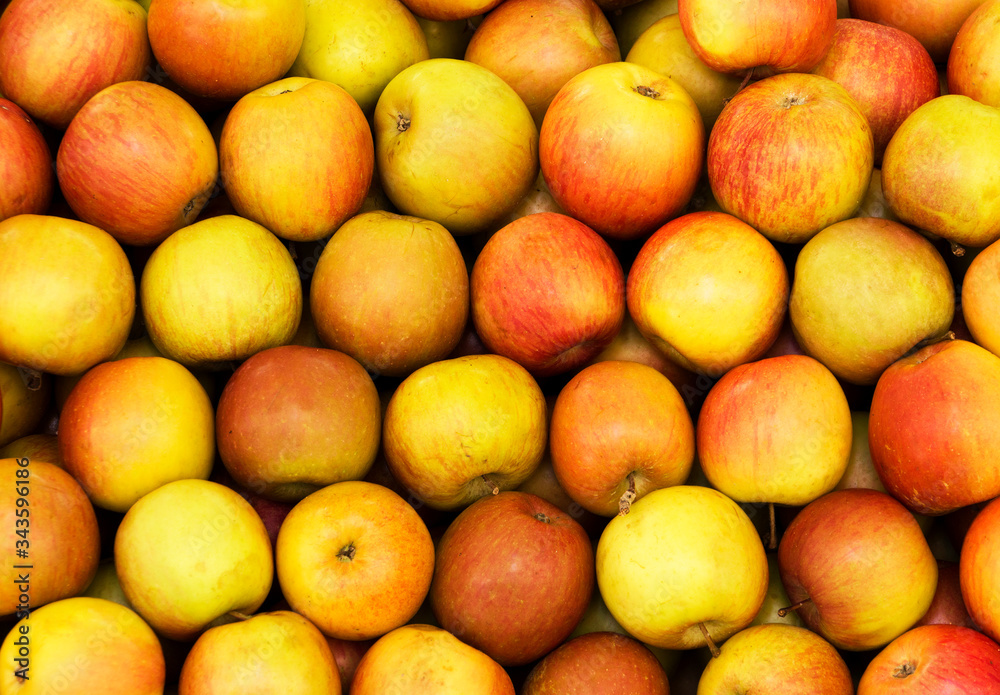 Red fresh ripe apples close up in the supermarket. Fruits harvest. Food Red fresh ripe apples close up in the supermarket. Fruits harvest. Food