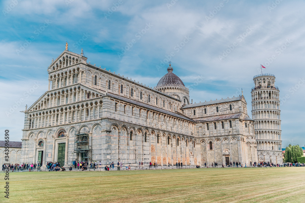 Cathedral of Pisa in Tuscany, Italy. Cloudy sky