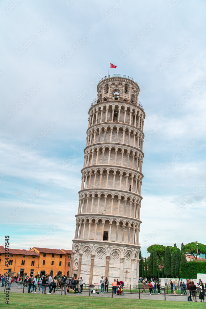 Historic leaning Tower of Pisa on a cloudy day