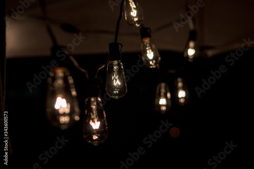 String of lightbulbs hanging from a tent