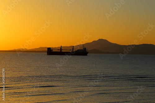 ship on the background of the Golden sunrise