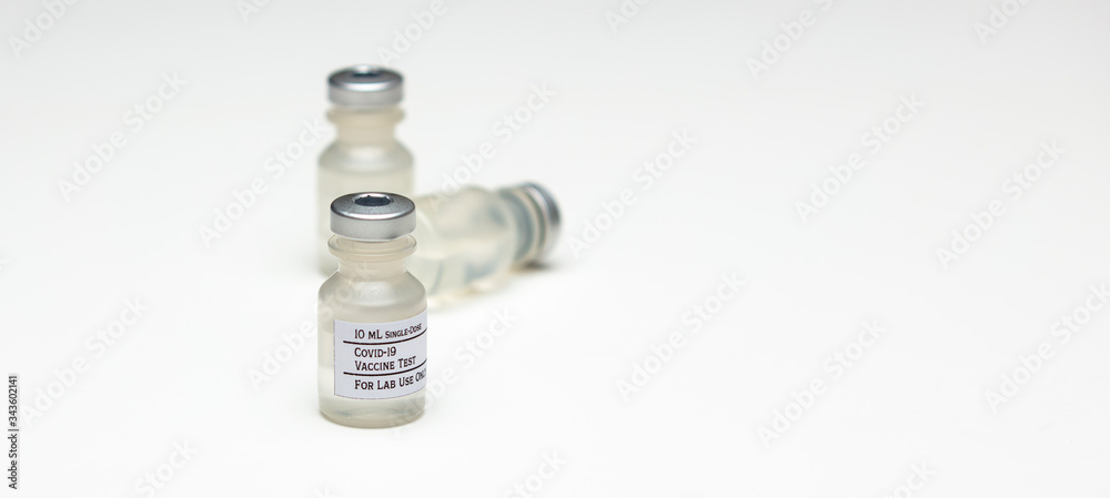 Covid-19 Vaccine Test Vials on White Covid-19 Vaccine Test Vials on White