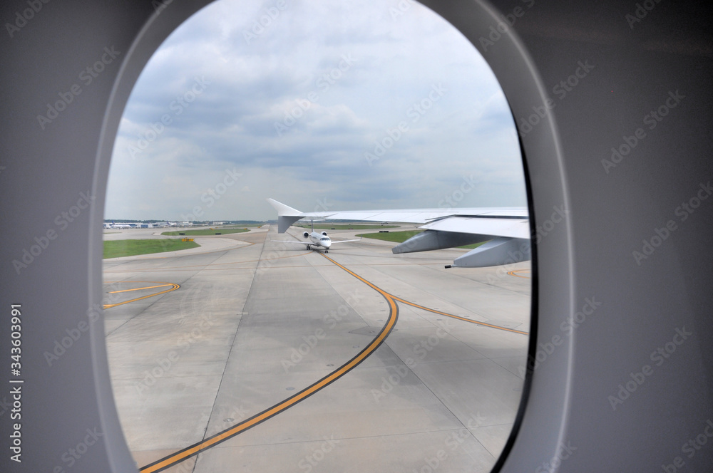 Fototapeta premium Runaway at the airport through plane window , Housto