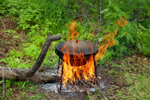  cooking on a campfire in nature