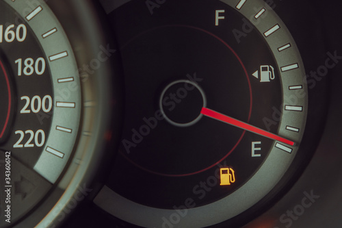 Fuel gauge with warning indicating low fuel tank