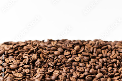 medium roast coffee beans on white