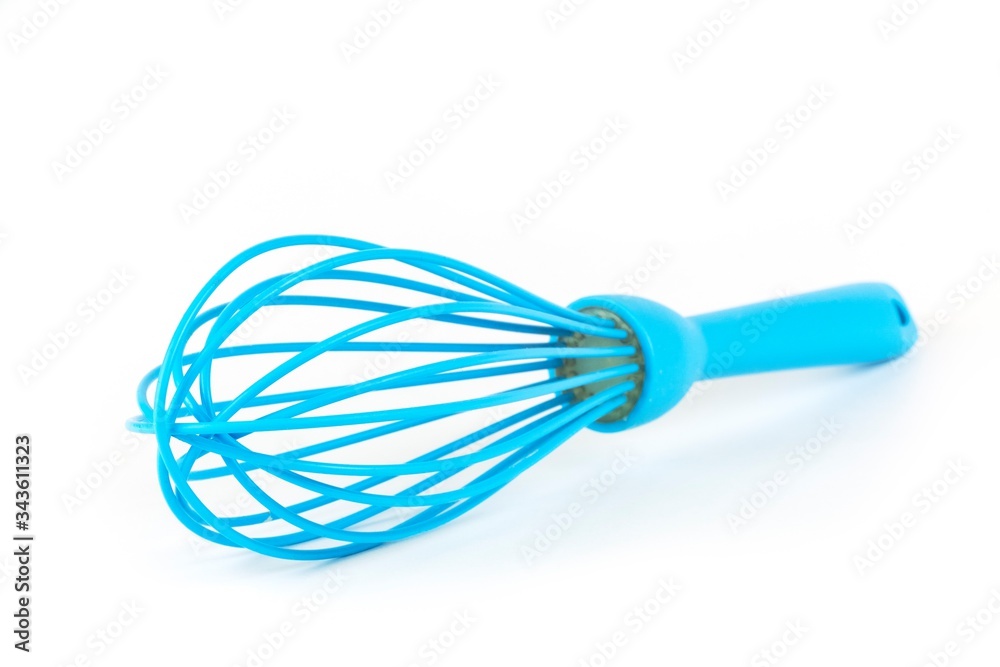 close-up blue whisk with shadows isolated on white background close-up blue whisk with shadows isolated on white background