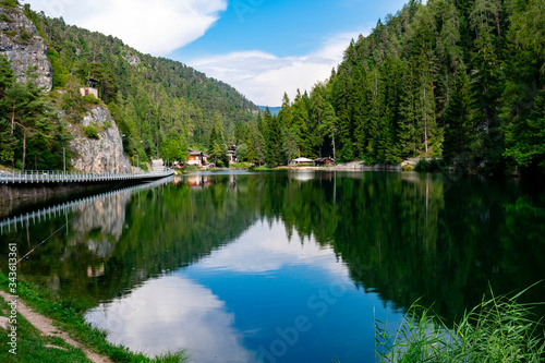 Fototapeta Naklejka Na Ścianę i Meble -  Non Valley, Trentino, Italy - 31 august 2019 - The beautiful Smeraldo lake in Fondo
