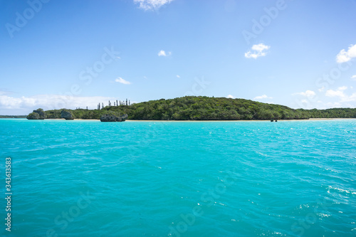 seascape of famous Upi bay, new caledonia: turquoise lagoon, typical rocks, blue sky © mathilde