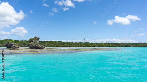 seascape of famous Upi bay, new caledonia: turquoise lagoon, typical rocks, blue sky © mathilde