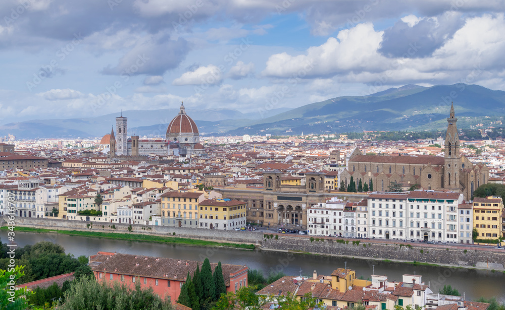 Aerial view of the city of Florence, Italy, with the Cathedral of Santa Maria di Fiori and the Basilica of Santa Croce in the background
