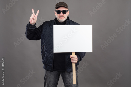 A man in black glasses with...