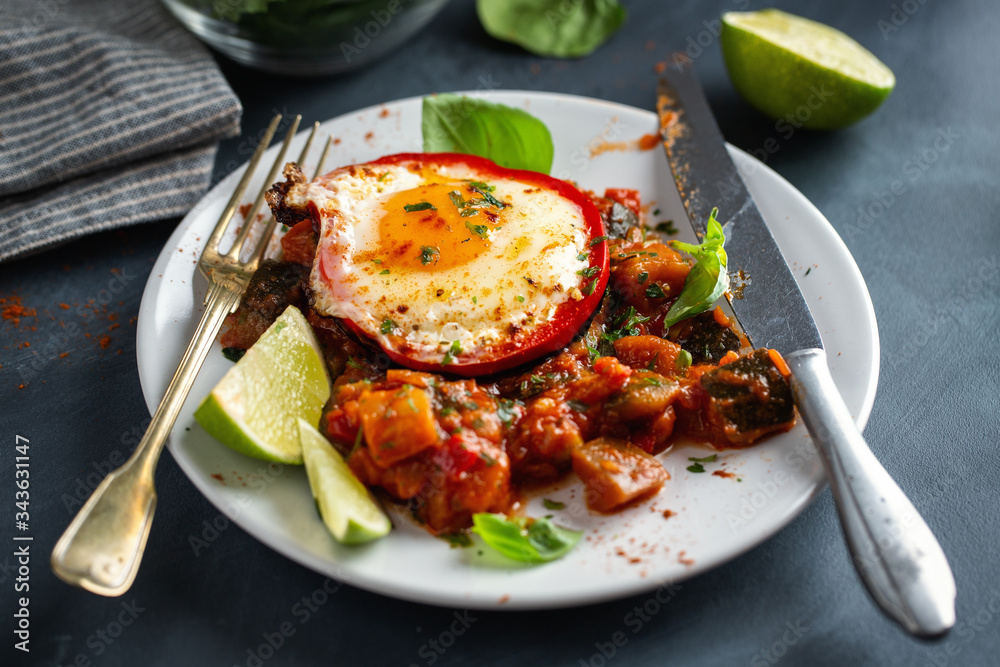 Fried egg with vegetables on plate Fried egg with vegetables on plate