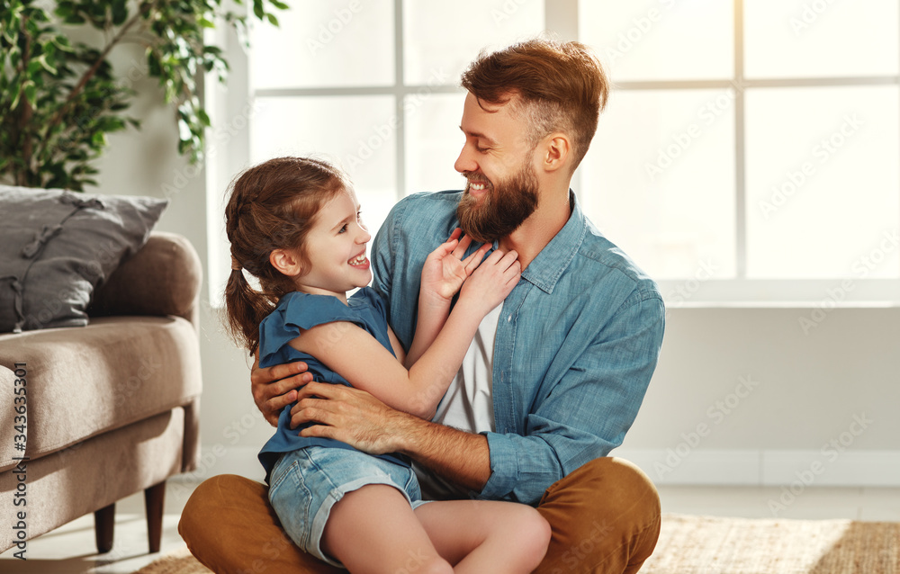Father and daughter having fun at home. Father and daughter having fun at home.