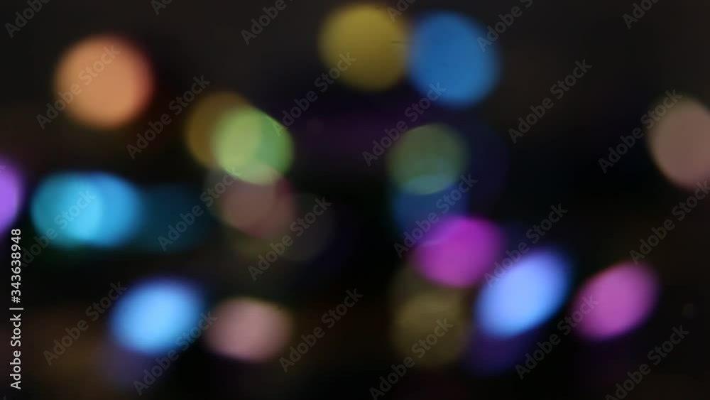 A spinning fast colorful fidget spinner macro close up
