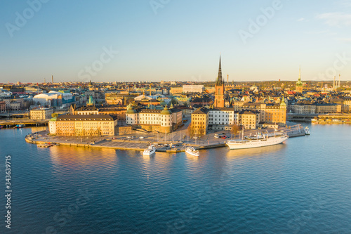 Aerial panoramic photo of Stockholm skyline drenched in beautiful sunset colors