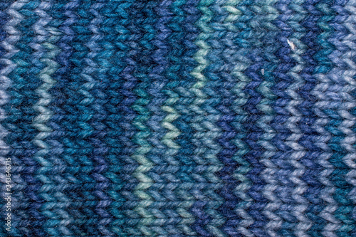 Blue wool fibers knitted wool fabric texture macro background