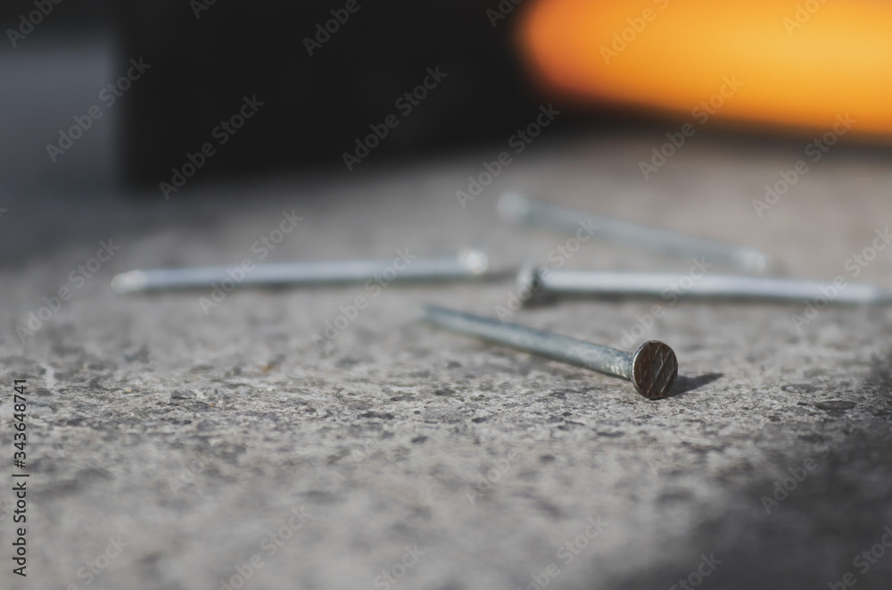 Construction nail close-up on a gray background Construction nail close-up on a gray background