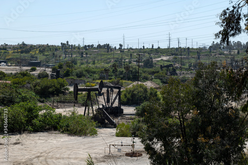 Oil pump jack working in an oil field