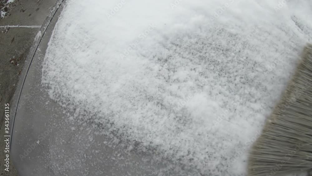 wiping snow off of car wiping snow off of car
