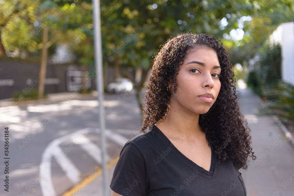 Black woman on urban background in casual clothing Black woman on urban background in casual clothing