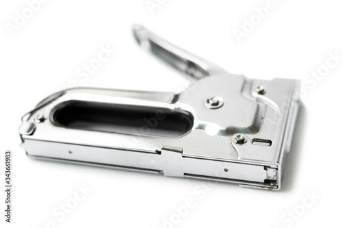 metall tacker or large construction metal stapler isolated on white background