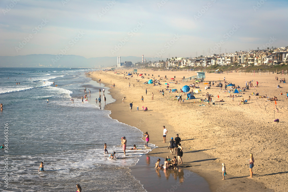 Manhattan Beach, California beaches with some people. Sand, ocean, sea. West coast landscape. Manhattan Beach, California beaches with some people. Sand, ocean, sea. West coast landscape.