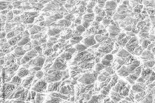Waves Pattern in crystal clear water on black and white © KarlaAcosta