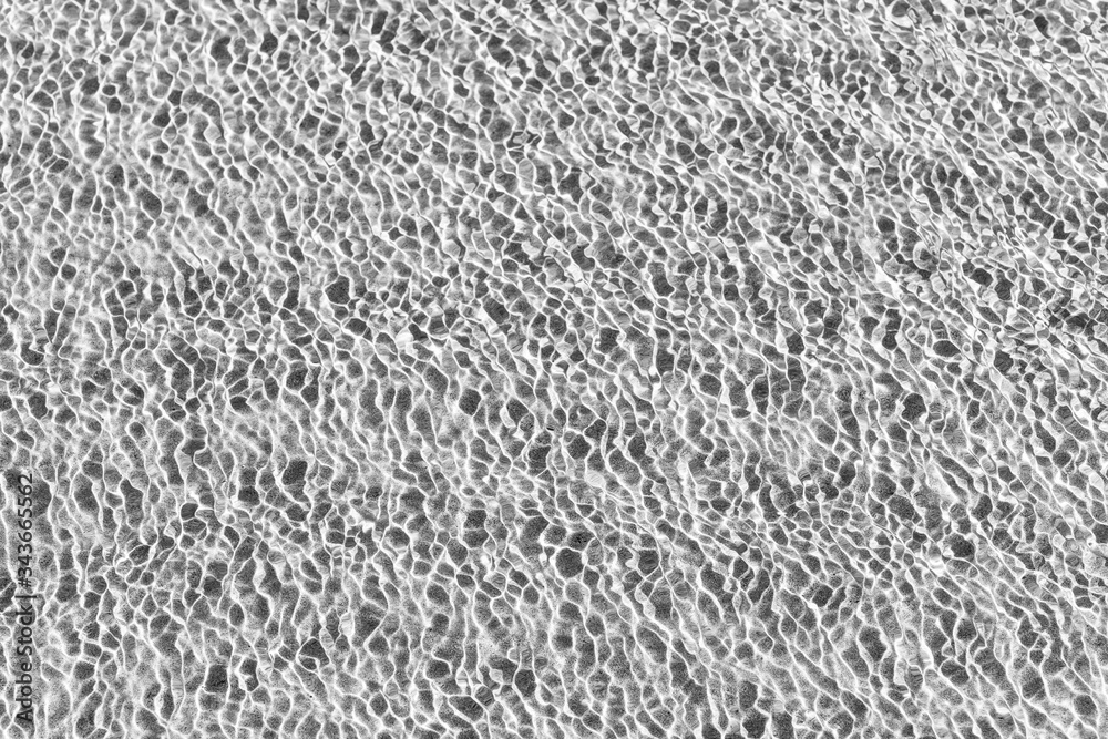 Waves Pattern in crystal clear water on black and white Waves Pattern in crystal clear water on black and white