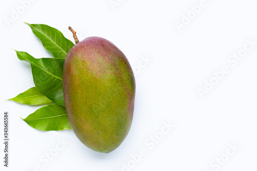 Mango, Tropical fruit with leaves on white background. Top view