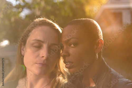 Romantic and fun portrait of a young lgbt couple on an urban background