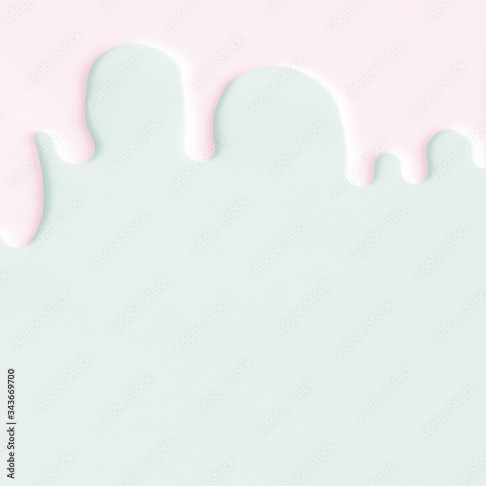 Liquid flowing down concept on pastel background Liquid flowing down concept on pastel background