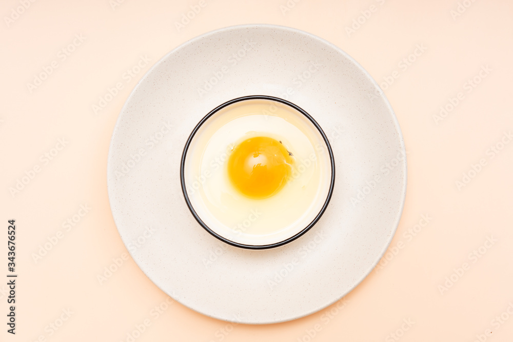 Raw eggs in a Chinese tableware dish Raw eggs in a Chinese tableware dish