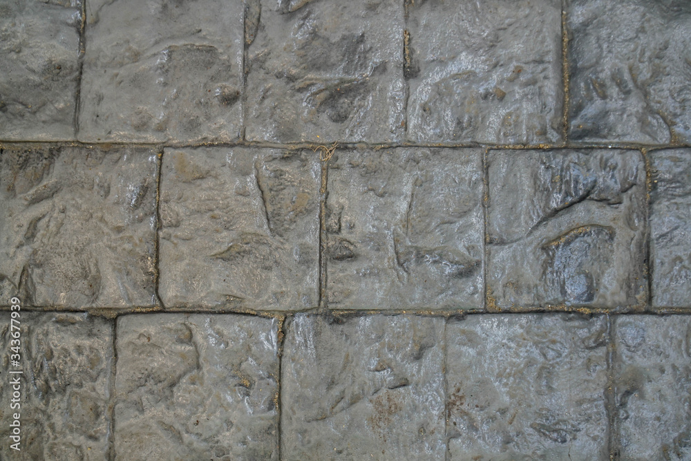 Fototapeta premium top view of grey brick tires for outdoors house decoration