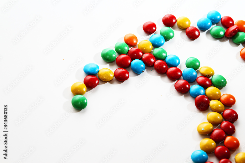 Colorful milk chocolate on white background Colorful milk chocolate on white background