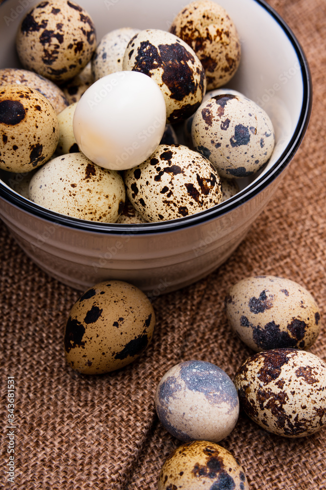Quail eggs on the linen tablecloths Quail eggs on the linen tablecloths