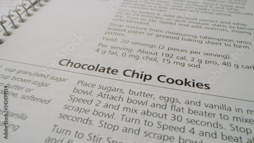 Camera flies over recipes and slides to stop at Chocolate Chip Cookies recipe