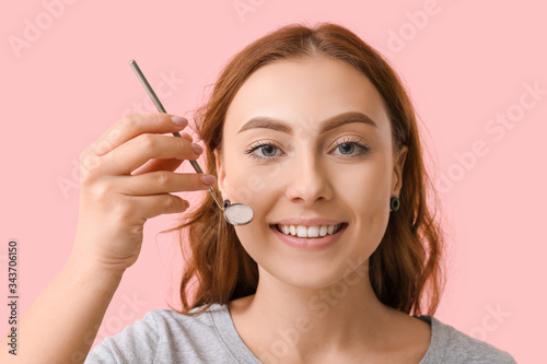 Beautiful young woman with ...