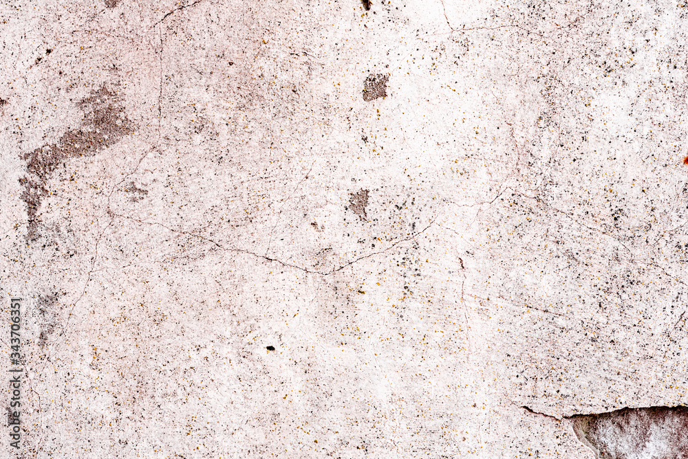 Texture of a concrete wall with cracks and scratches which can be used as a background Texture of a concrete wall with cracks and scratches which can be used as a background