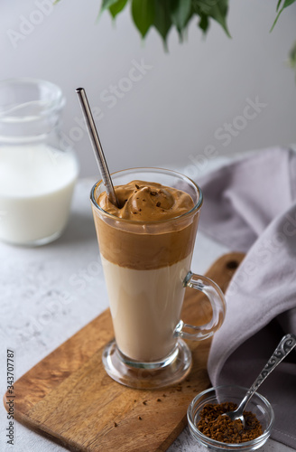 Cold Dalgon coffee, a Korean drink with whipped coffee and milk photo