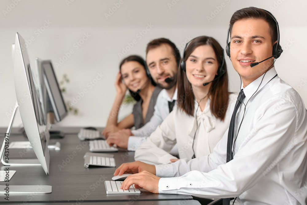 Team of technical support agents working in office Team of technical support agents working in office
