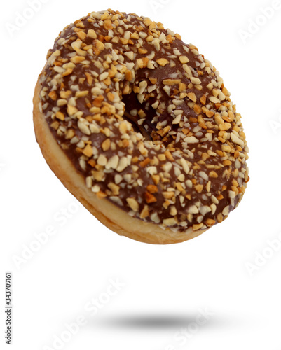 chocolate donut dessert with chocolate glaze and nuts sprinkles isolated on white background